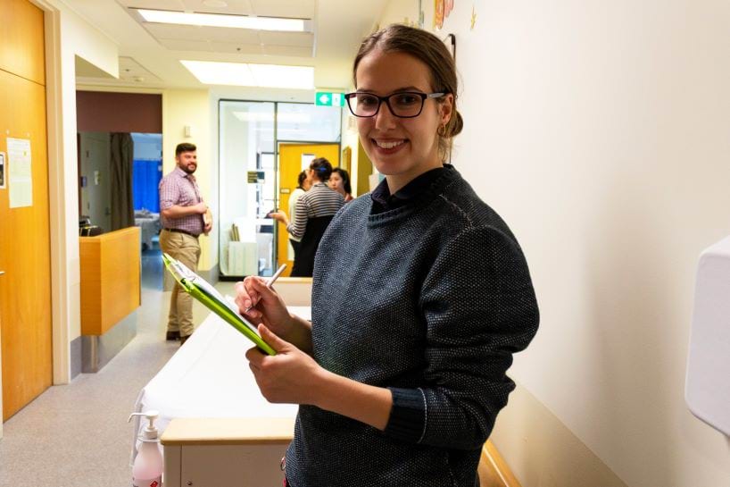 Picture of similing woman in a health service setting